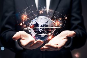 businessman-holding-hands-with-global-connection-concept-energy-saving-concept (1)