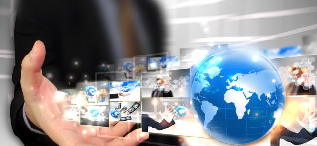 businessman-holding-world-technology-concept (1)