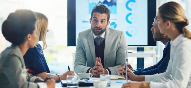 discussion-boardroom-talking-man-meeting-explaining-stock-market-growth-sales-group-employee-people-with-computer-finance-increase-investor-business (1)